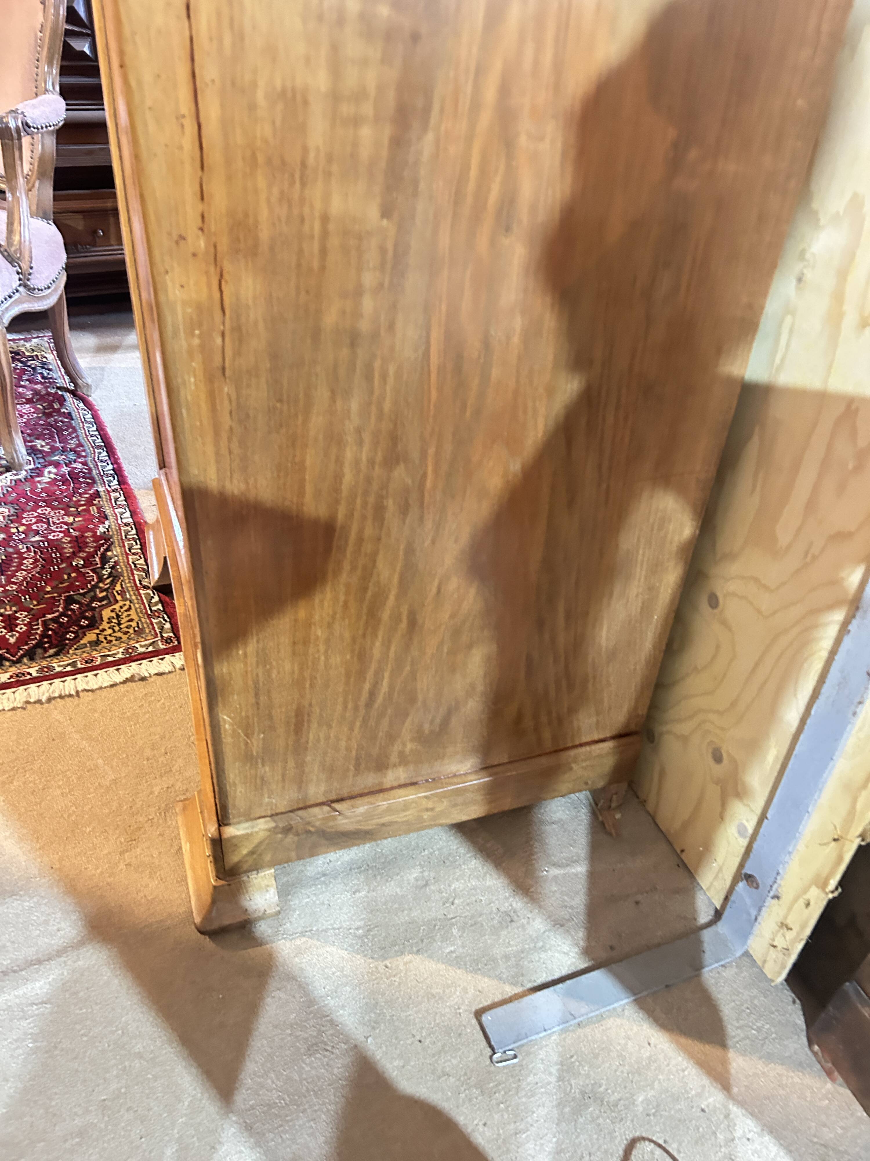 Standing man or a Louis Philippe wardrobe door.