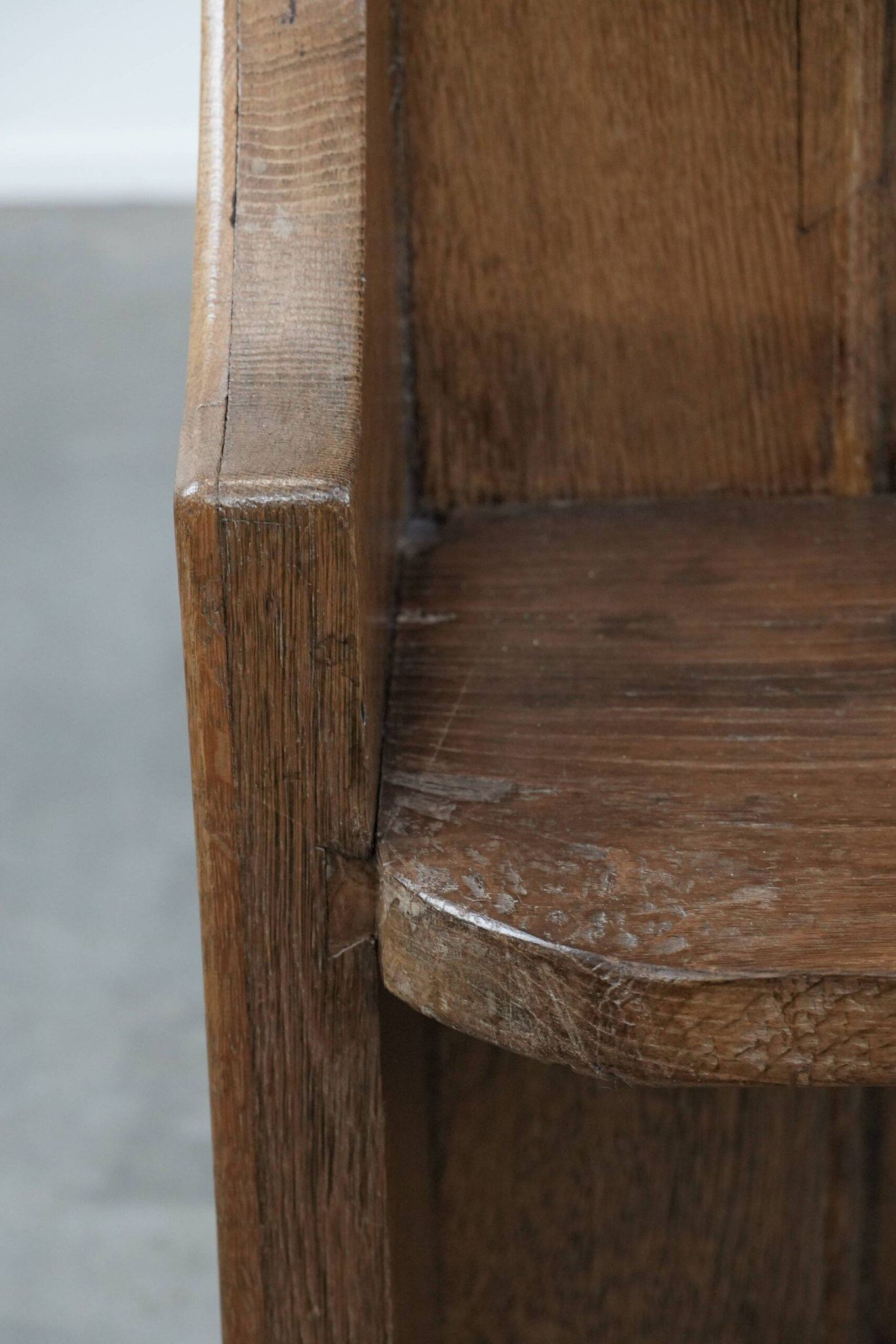 Antique oak church bench in Gothic style with beautiful wood carving