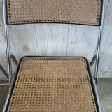 Pair of chrome and cane folding chairs