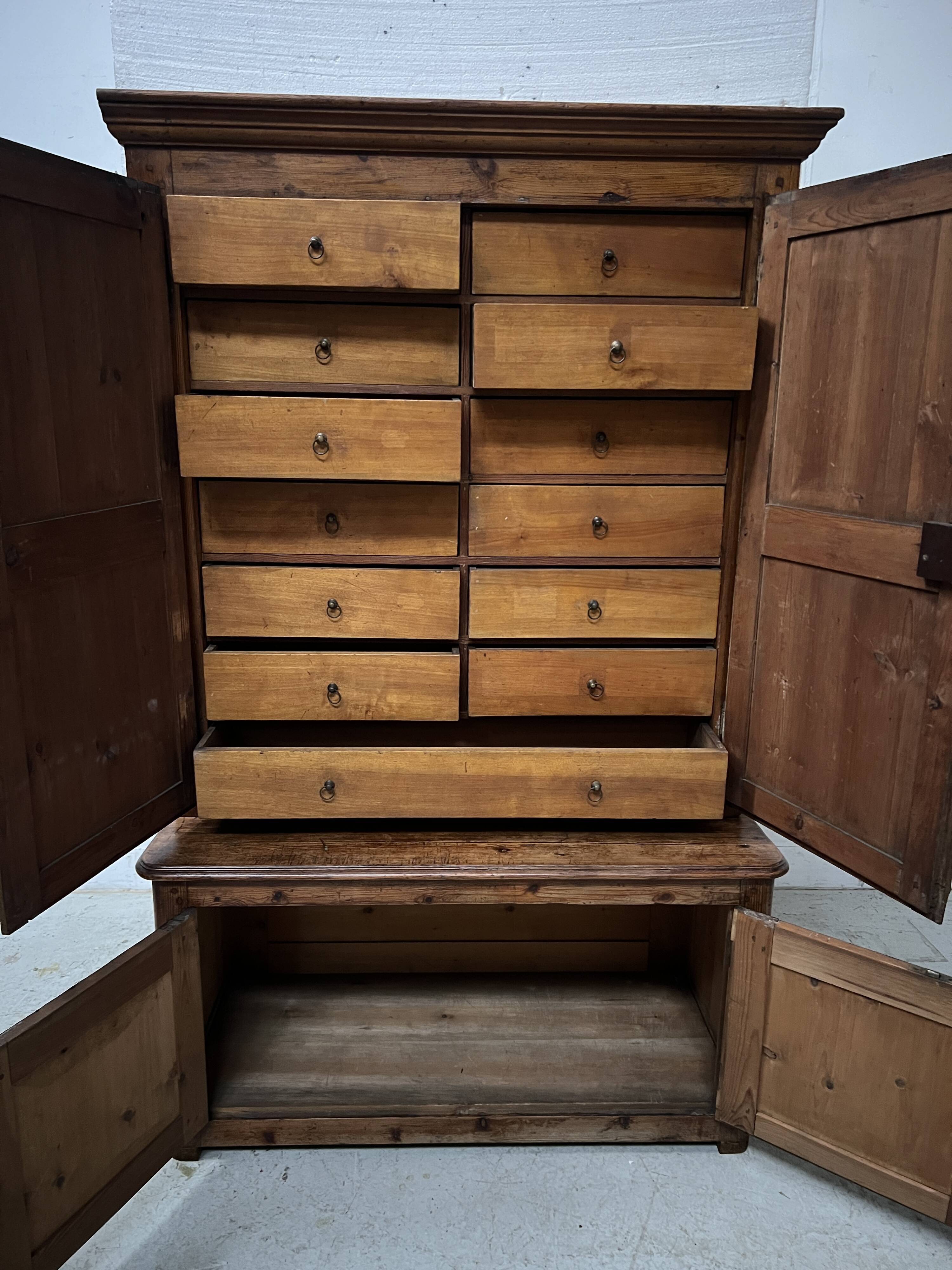 Two-part office furniture made of solid pine from the 20th century.