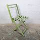 Child's folding chair in patinated green wood