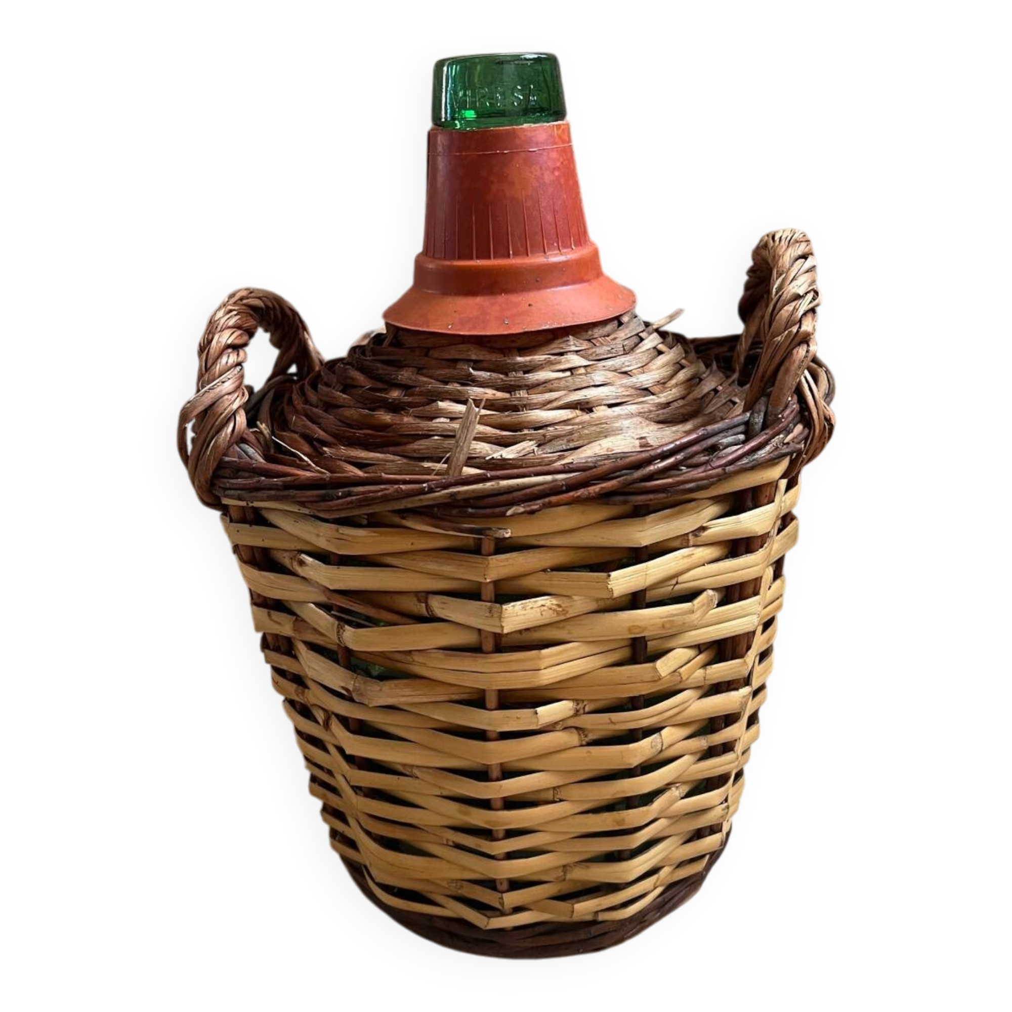 Old glass demijohn with wicker basket.