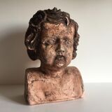 Bust old child in plaster stamped l.j.c.