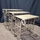 Nesting tables in patinated iron.