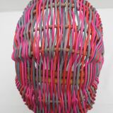 Small multi-colored wicker basket for children
