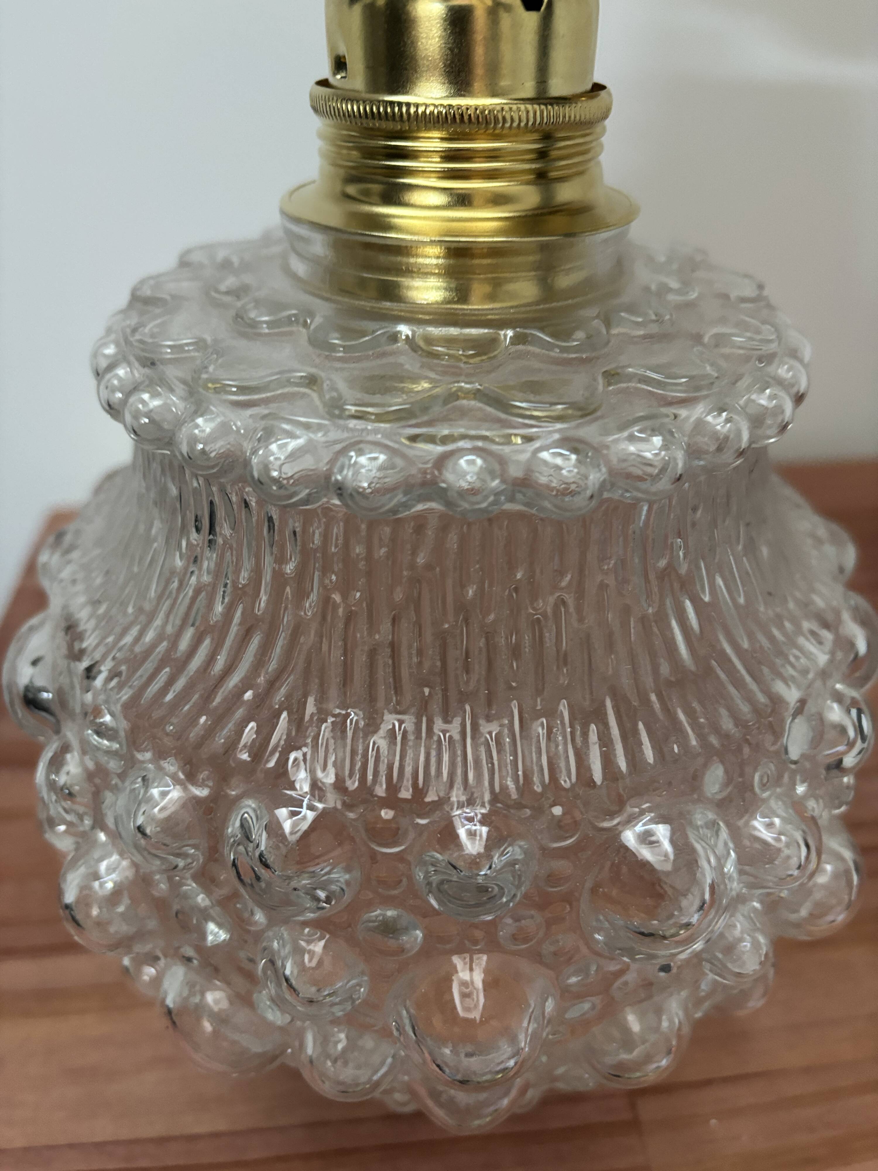 Gold wall light with bubble glass