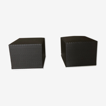 Pair of black synthetic rattan poufs from Flamant