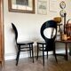 2 chaises "Mouette" par Baumann en bois noir