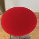 Pair of 70's style metal bar stools in pop red