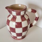 Old ceramic pitcher pattern checkerboard tiles