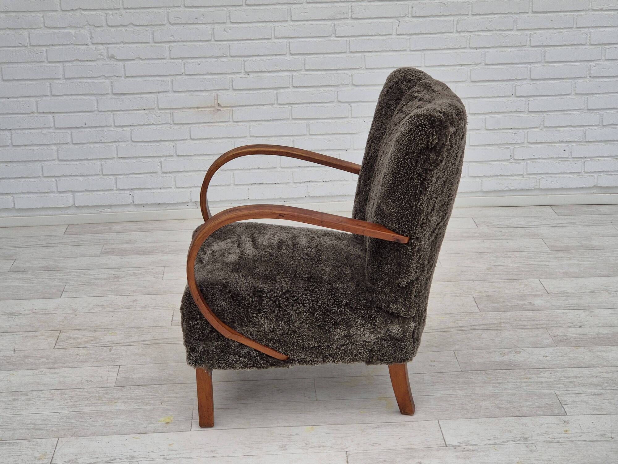 1950s, Danish design, reupholstered armchair, genuine sheepskin "Wellington".
