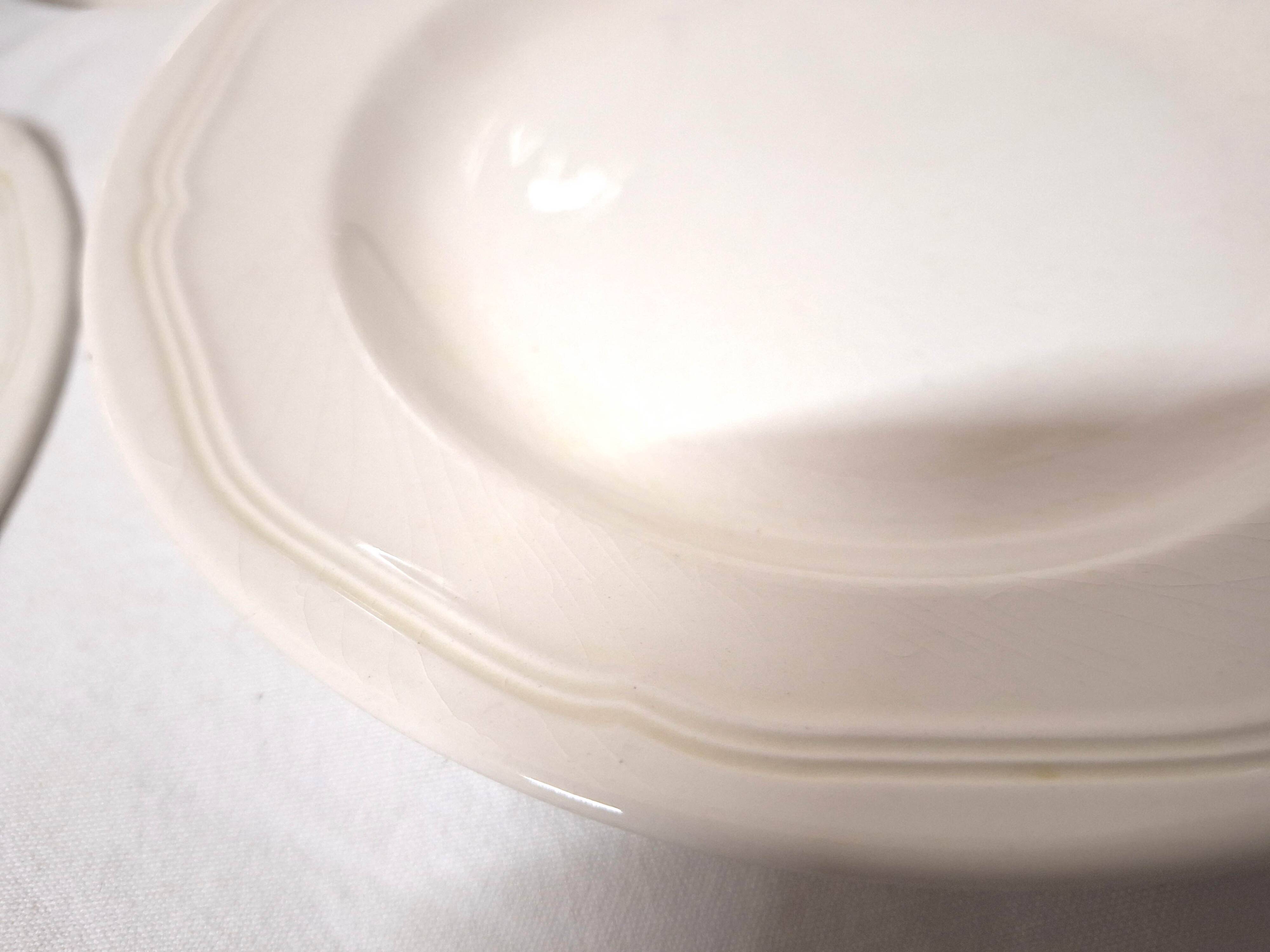 15 white earthenware plates