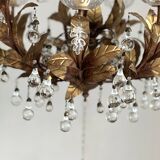 Chandelier with tassels and golden brass