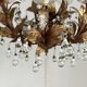 Chandelier with tassels and golden brass