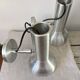 Pair of brushed metal wall sconces