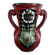 Red vase with floral decoration