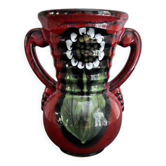 Red vase with floral decoration