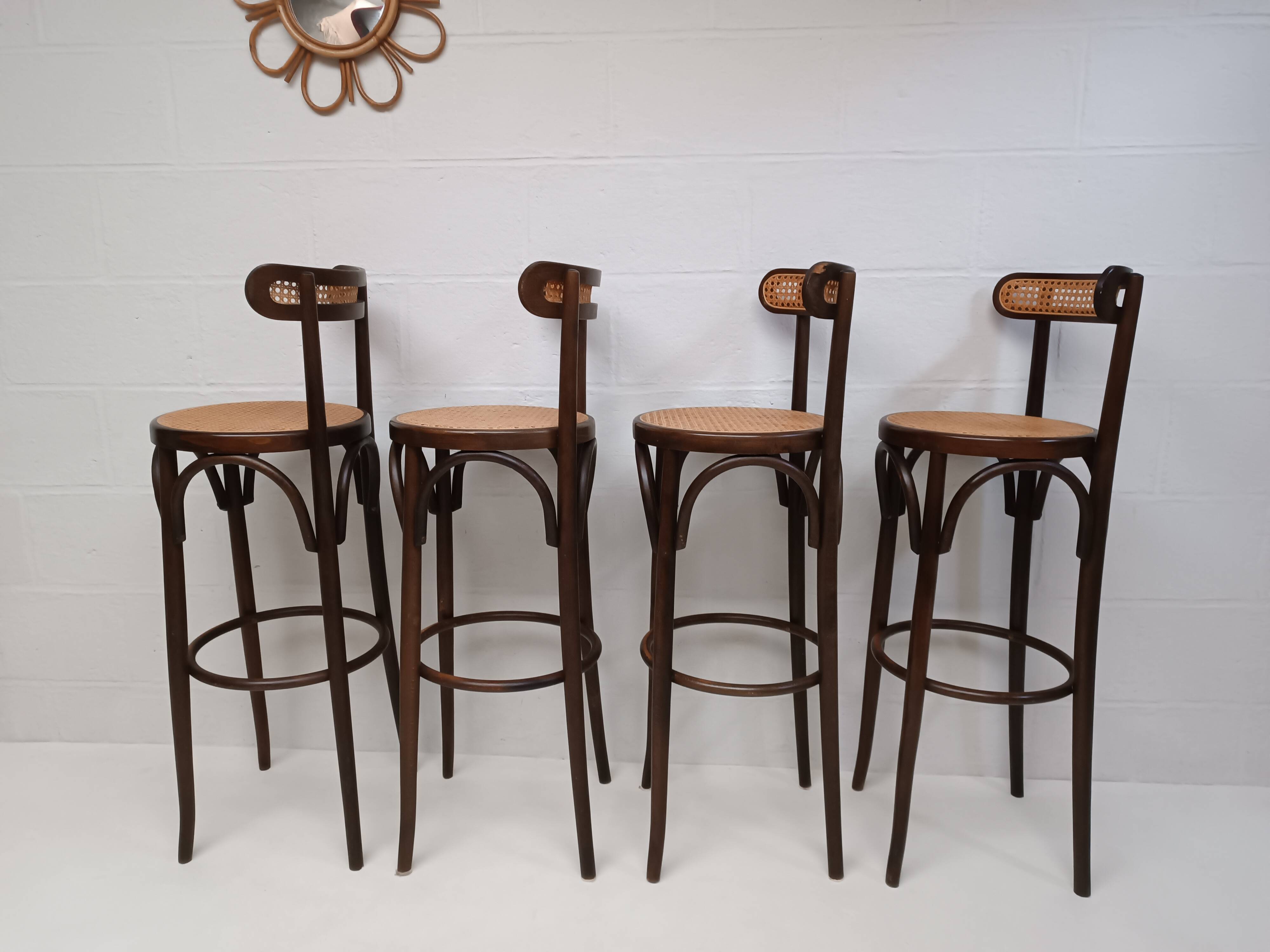 4 curved wood and cane bar stools
