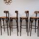 4 curved wood and cane bar stools