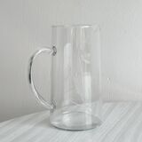 Glass pitcher with decoration of engraved ears of wheat.