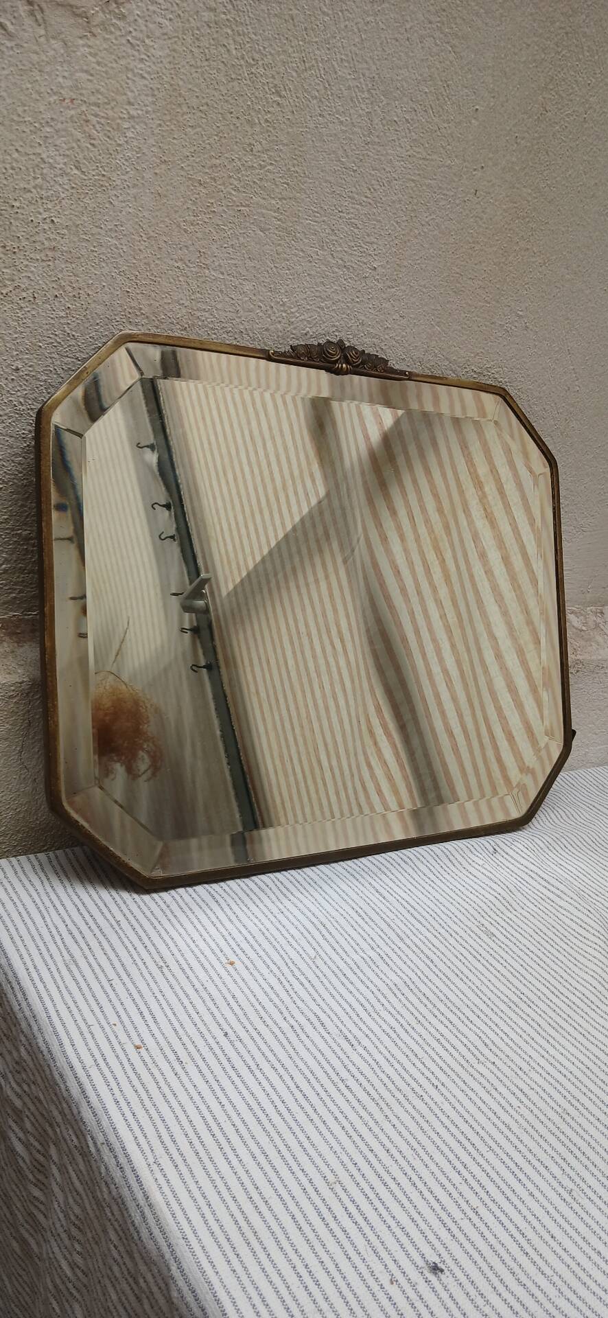 Bevelled mirror with brass frame Art Deco