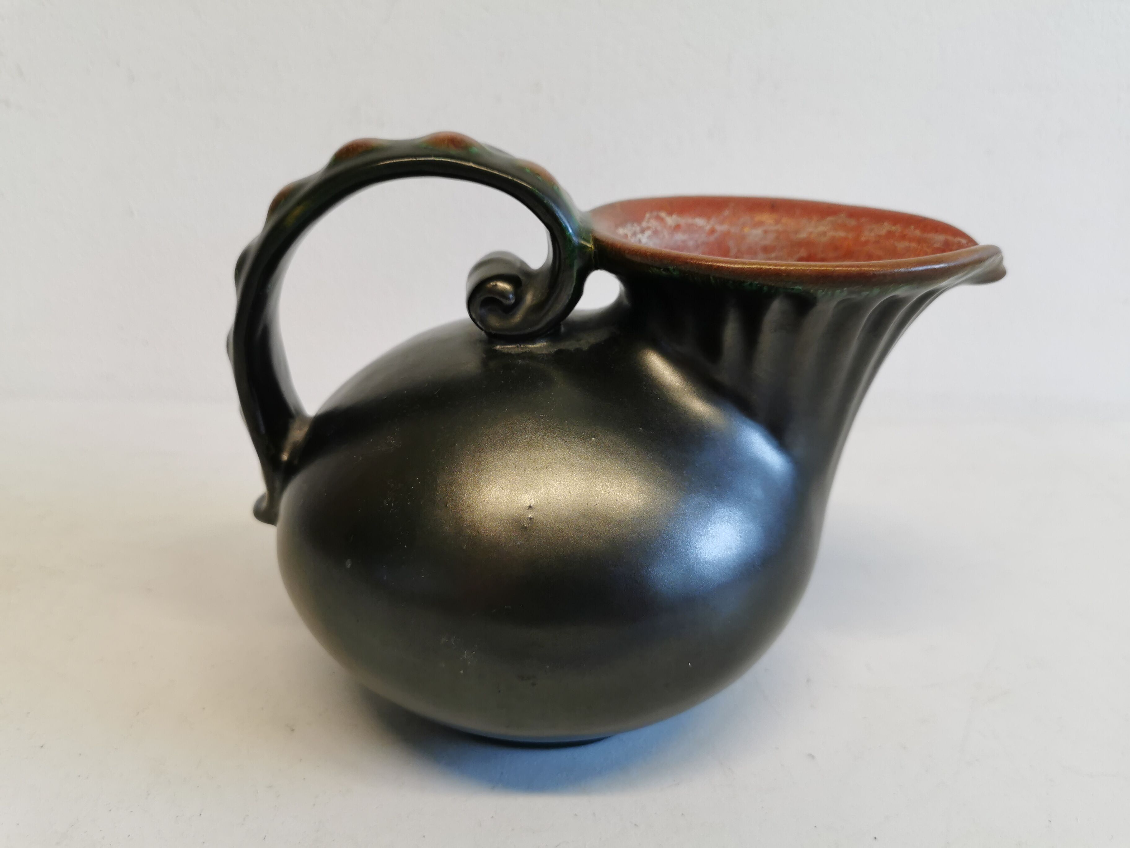 Keramic jug in metal glaze, from Danish Michael Andersen (Stamped with the 3 fish at the bottom)