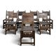 Set of 8 Gothic-style chairs in oak and studded leather.