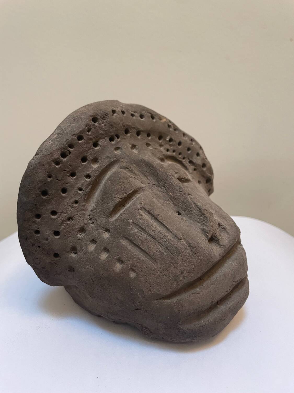 Primitive art head sculpture