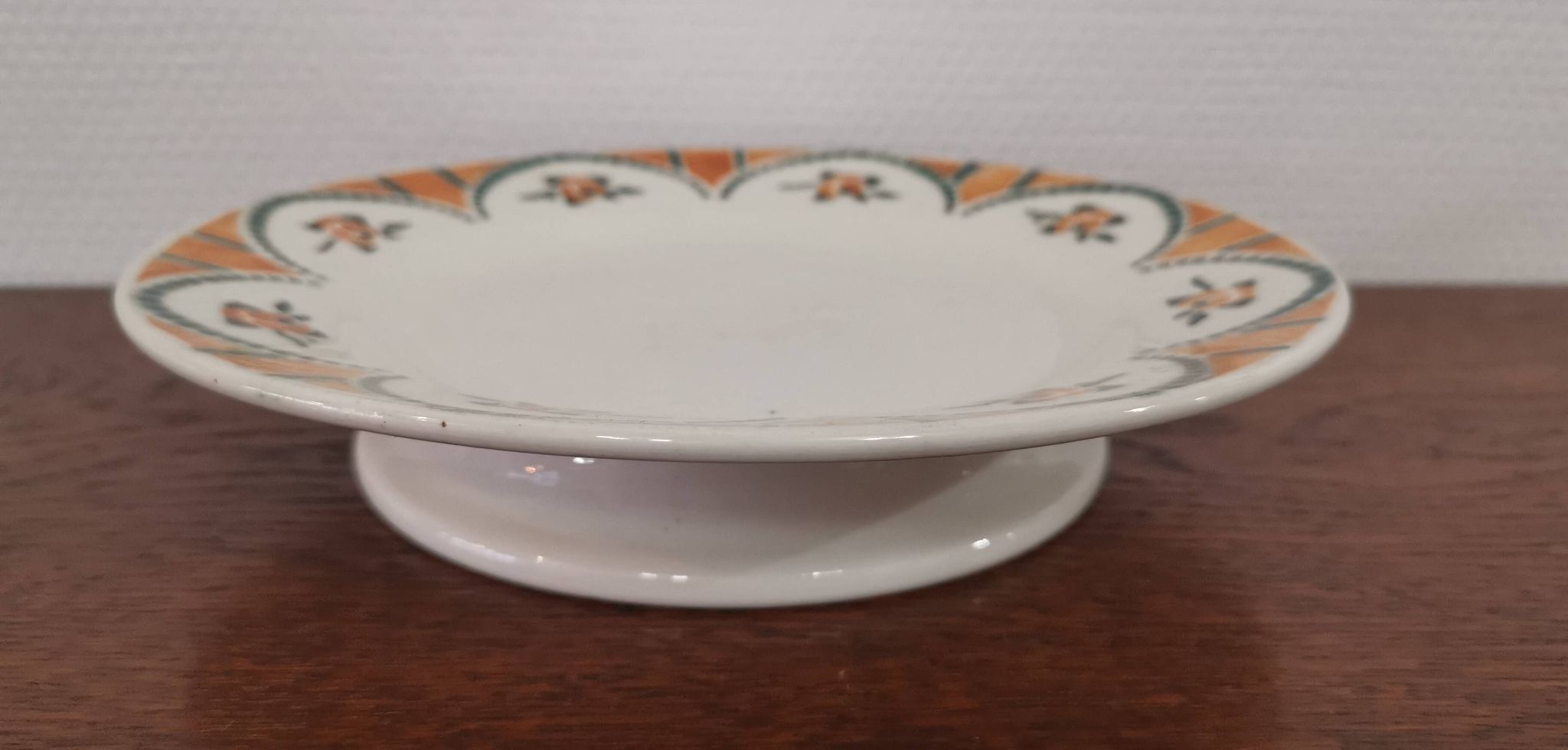 Old round dish on shower stand in art deco earthenware from the 1930s
