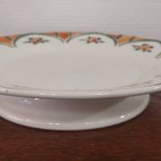 Old round dish on shower stand in art deco earthenware from the 1930s