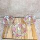 Set of 3 vintage pressed glass bowls with pink floral decoration.