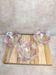 Set of 3 vintage pressed glass bowls with pink floral decoration.