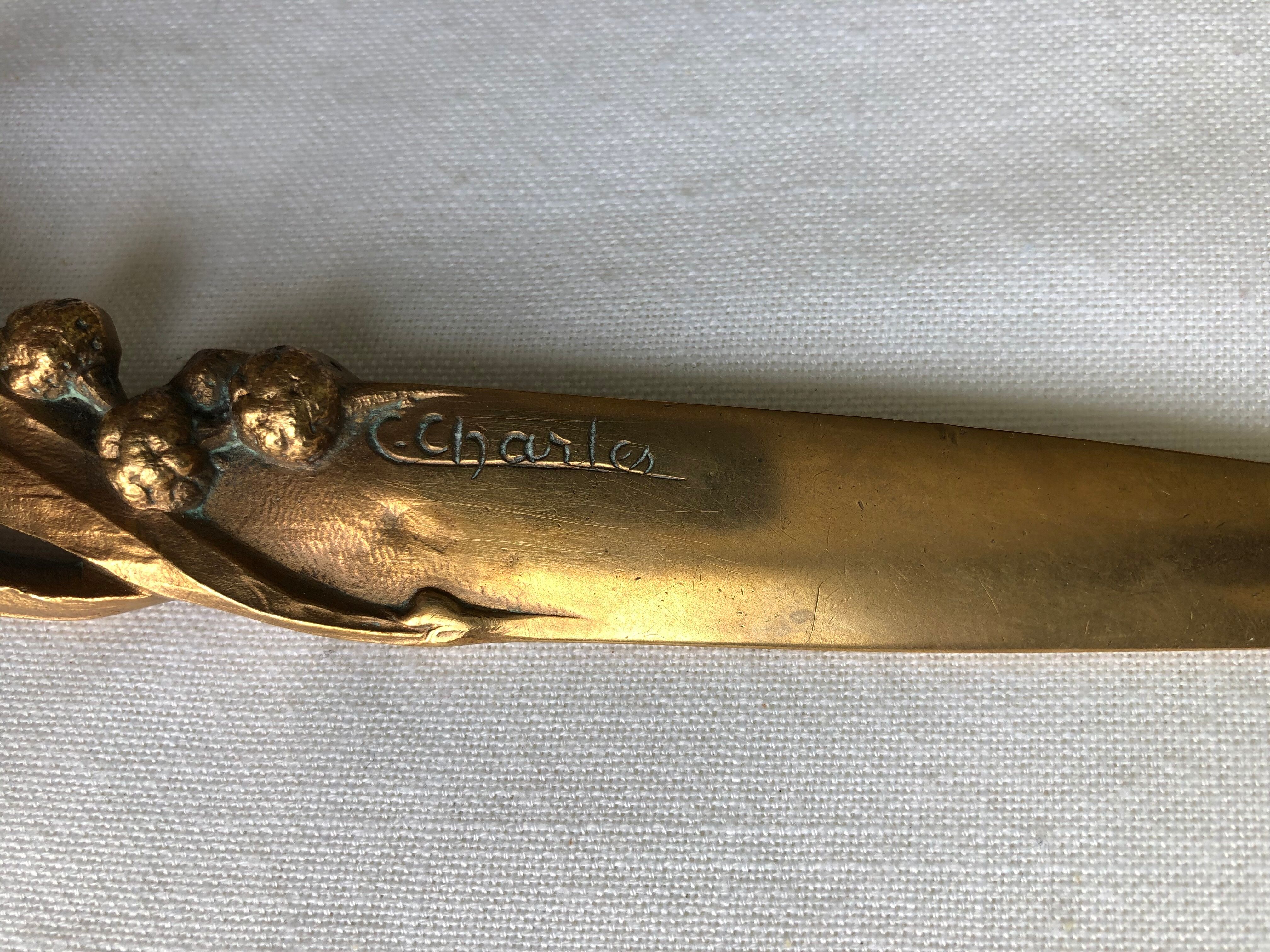 Opens letters cut bronze paper signed