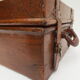 Rectangular wooden suitcase covered with leather