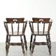 Set of two wooden English antique captain chairs from the late 19th century