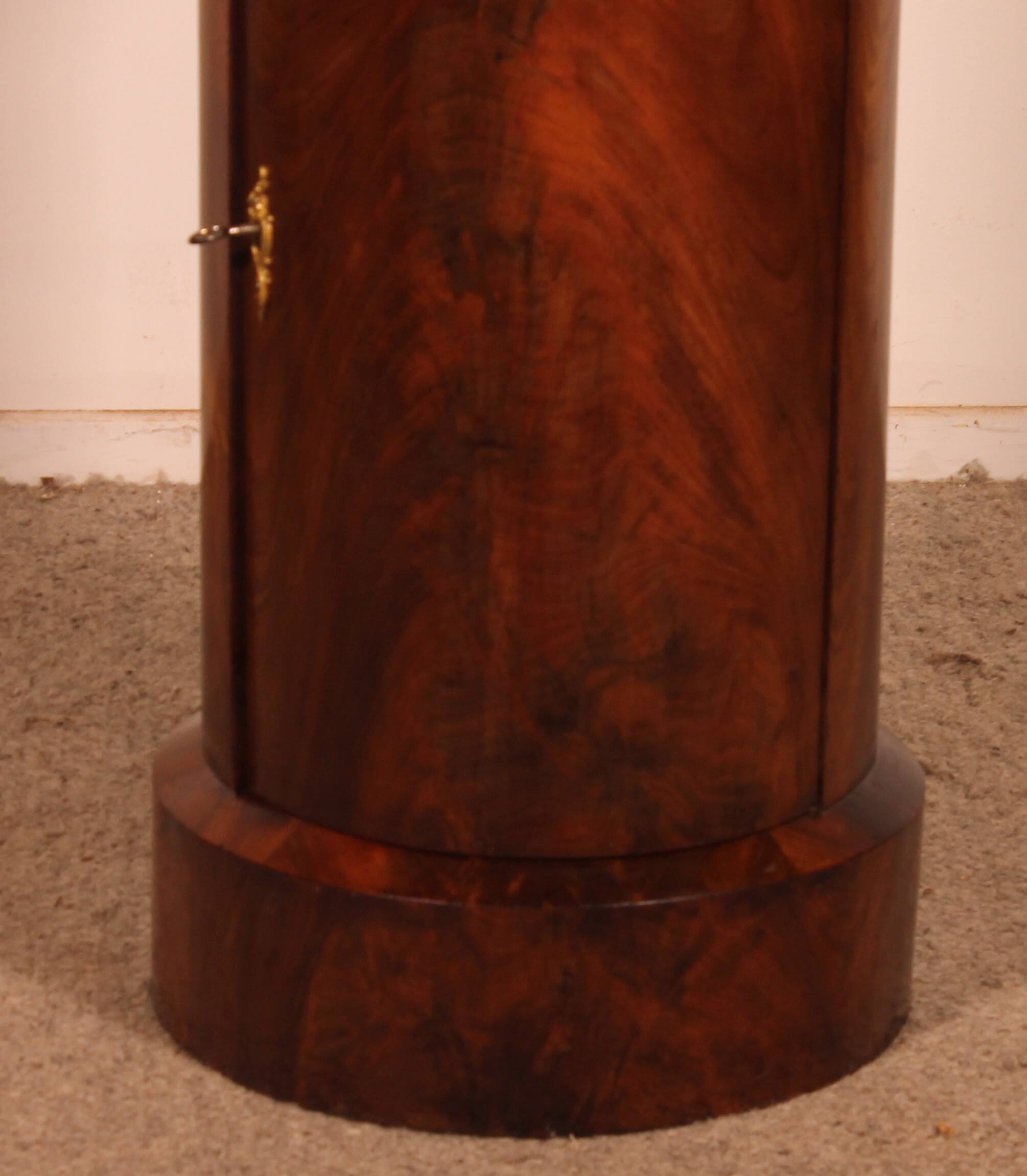 large Empire period flamed mahogany headboard.