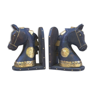 Horse bookbands in carved wood and brass