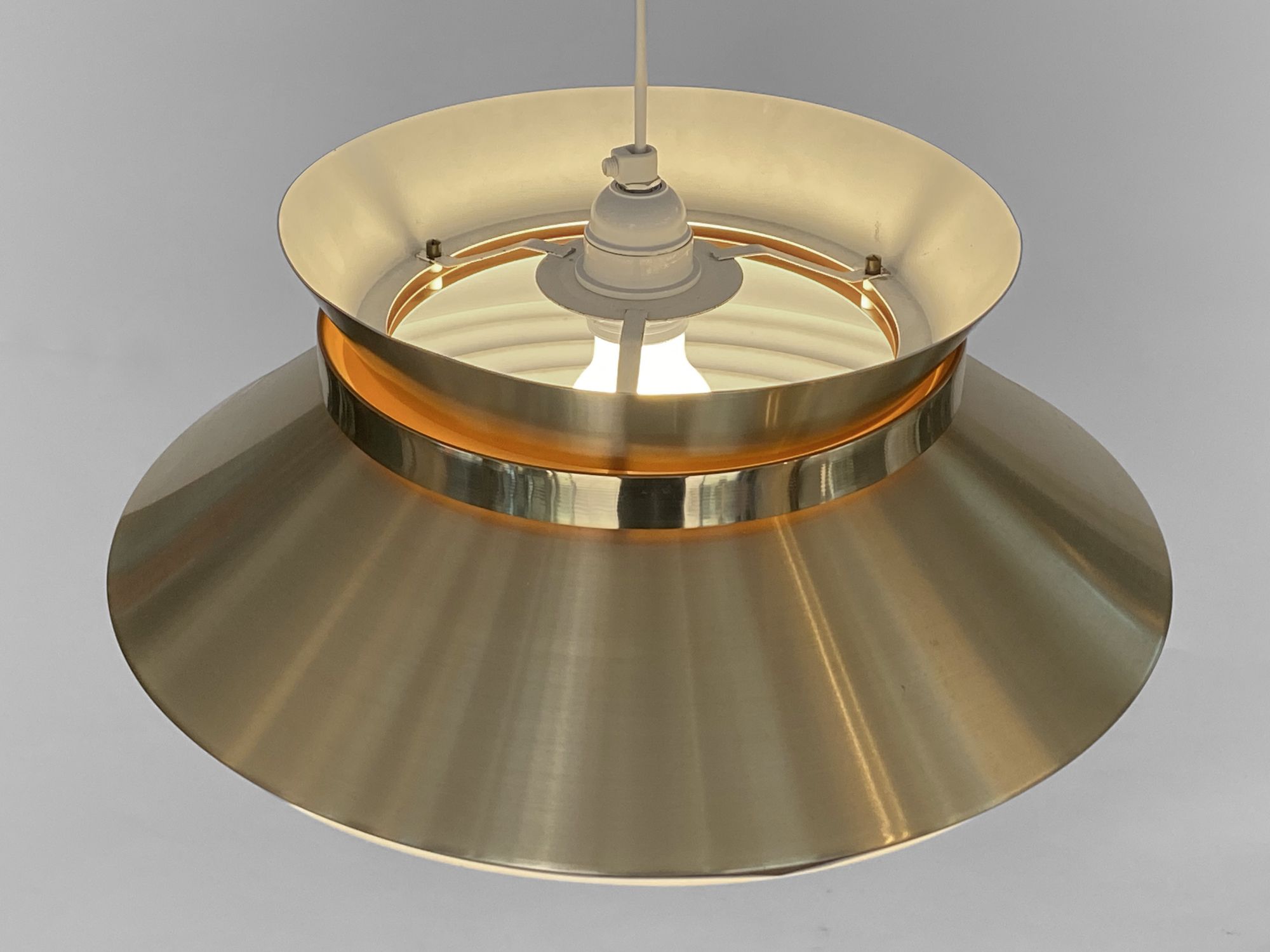Brass colored aluminium pendant light by Carl Thore for Granhaga Metall. Sweden 1970s