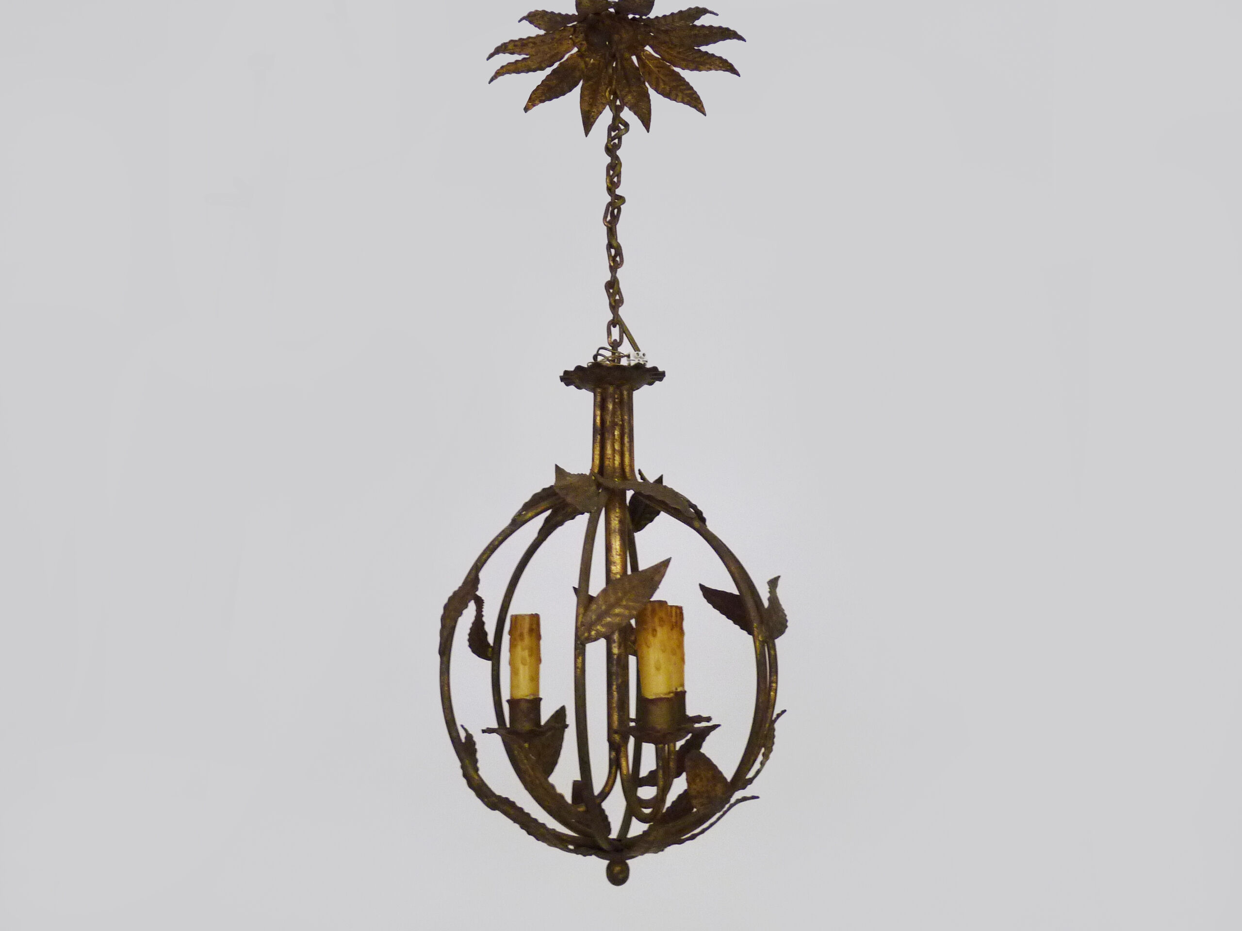 Vintage cage chandelier in aged golden metal and foliage, antique lighting, 3-burner chandelier. Year 60