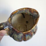 Ceramic pitcher in the shape of a coloquinte melo.