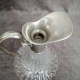 Glass and silver metal wine carafe