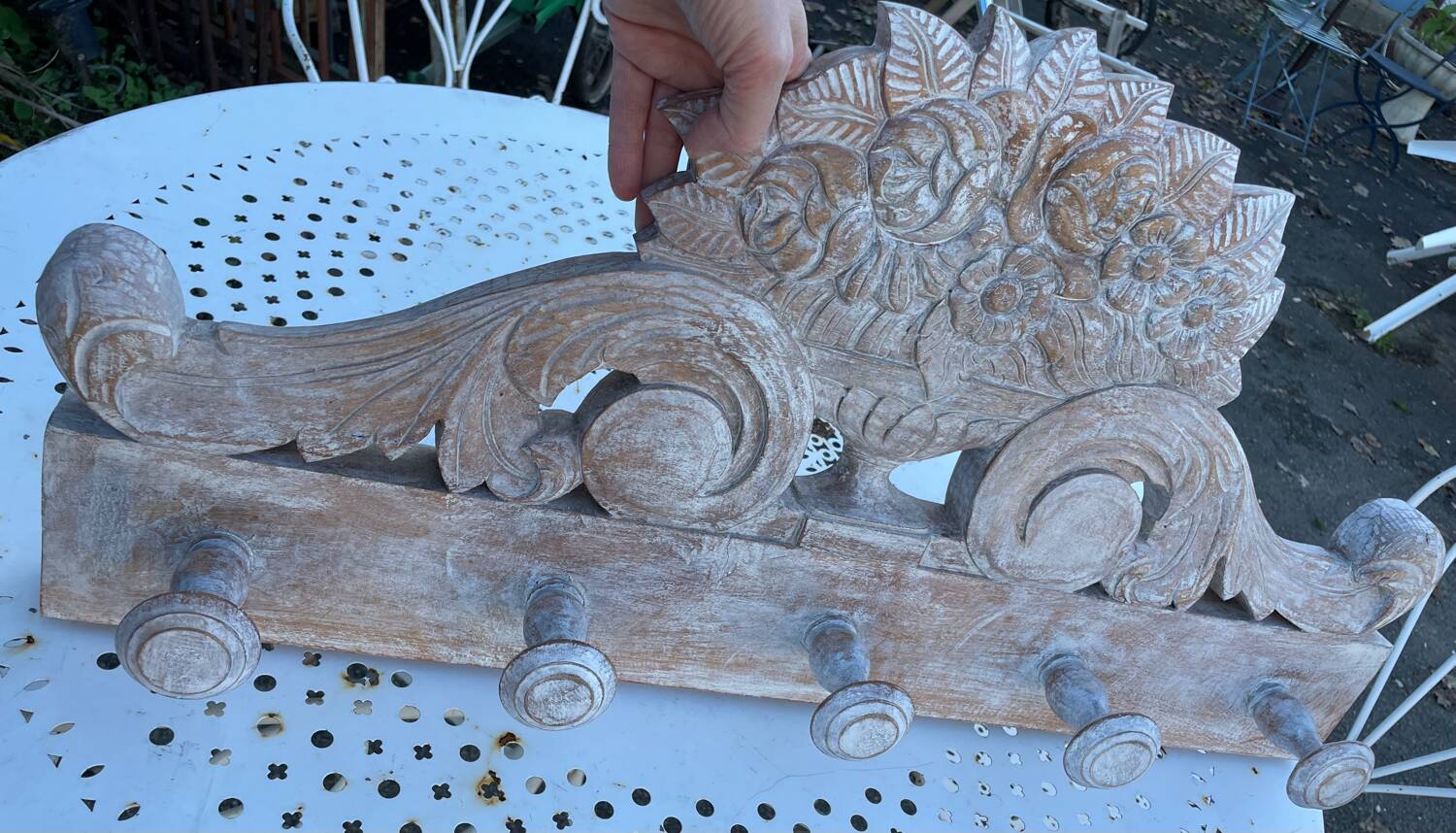 Raw carved wood coat rack