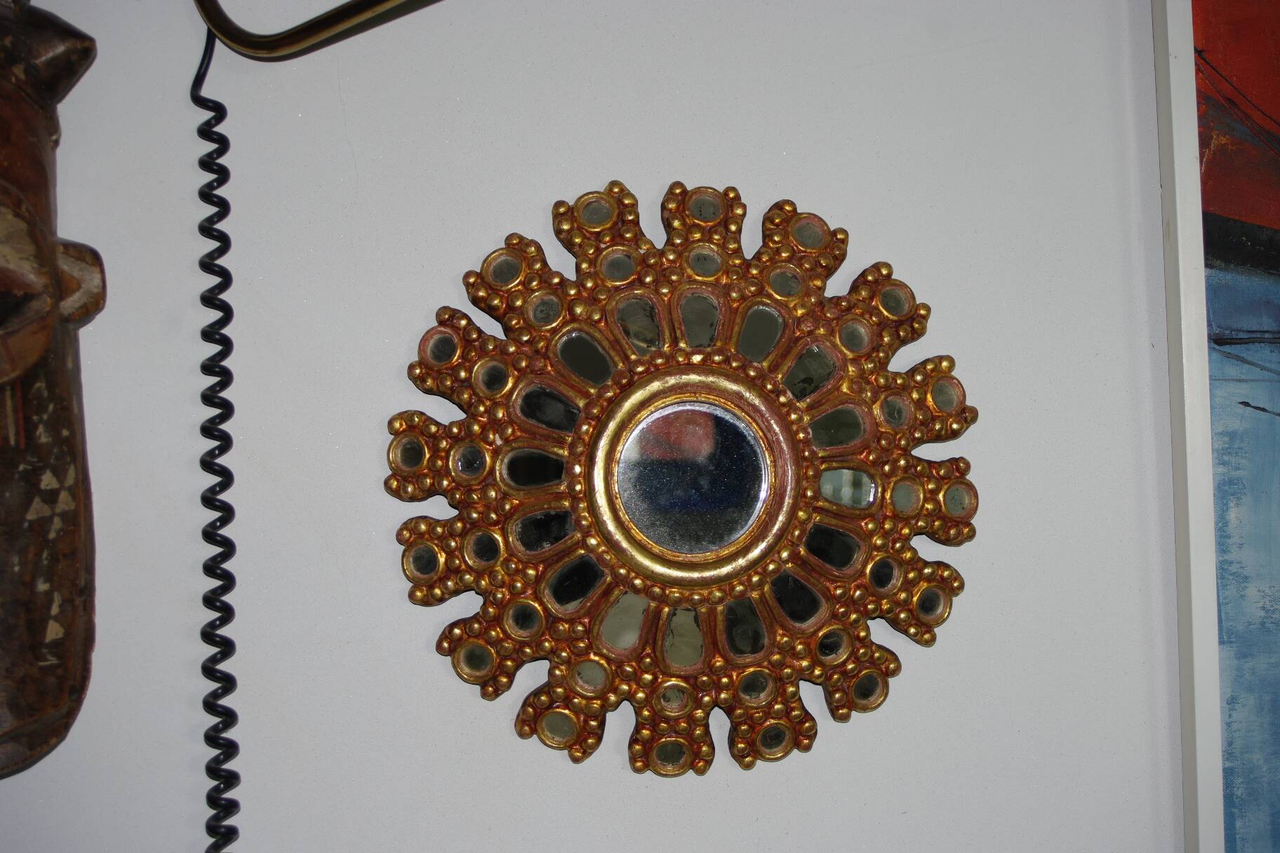 Vintage multi-faceted witch mirror in golden wood 1960 rare