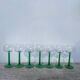 7 green glass stemmed glasses