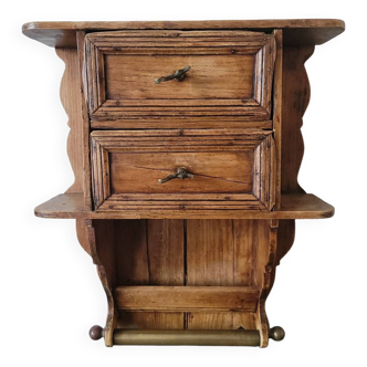 Small antique wall shelf with a drawer in light solid wood.