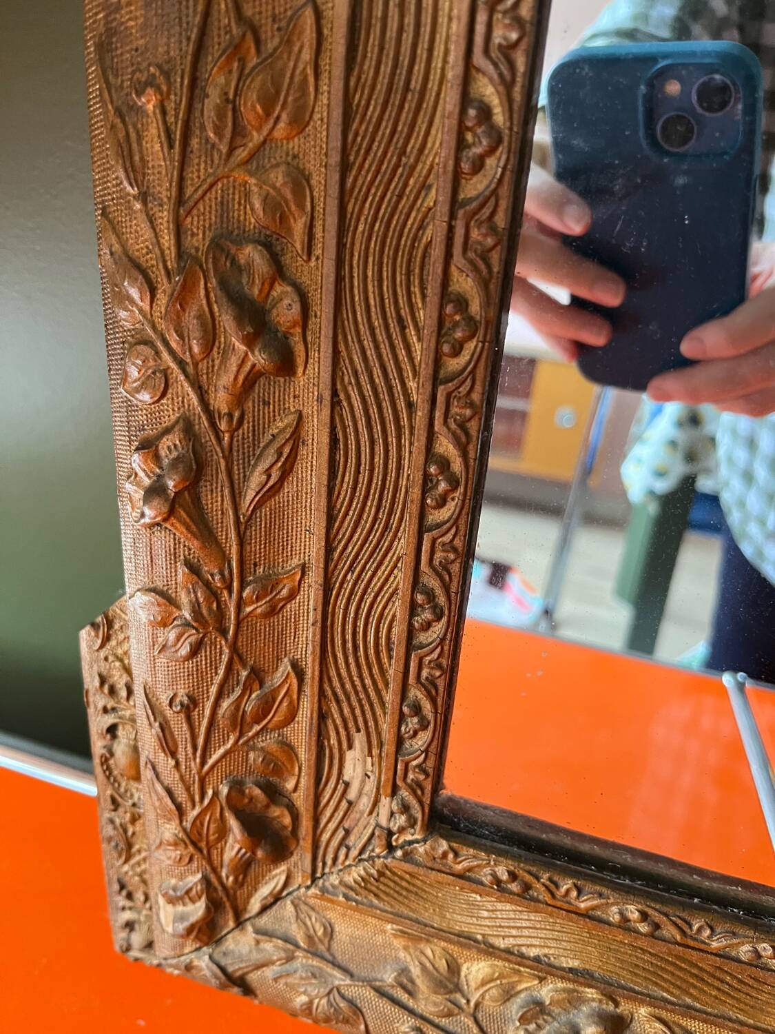 Golden trumeau mirror for fireplace, late 19th century, with sculpted pediment.
