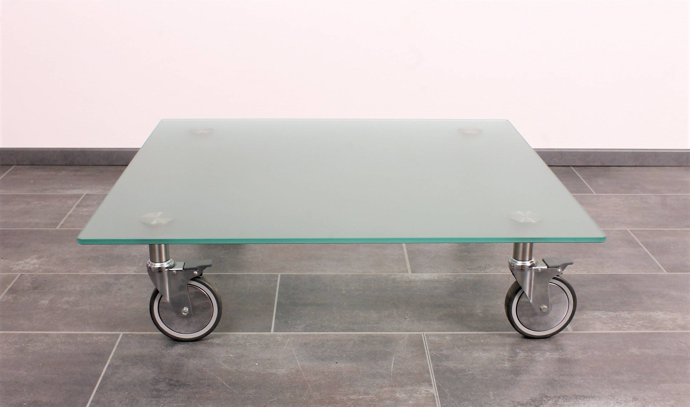 Wheeled glass coffee table