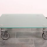 Wheeled glass coffee table