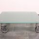 Wheeled glass coffee table