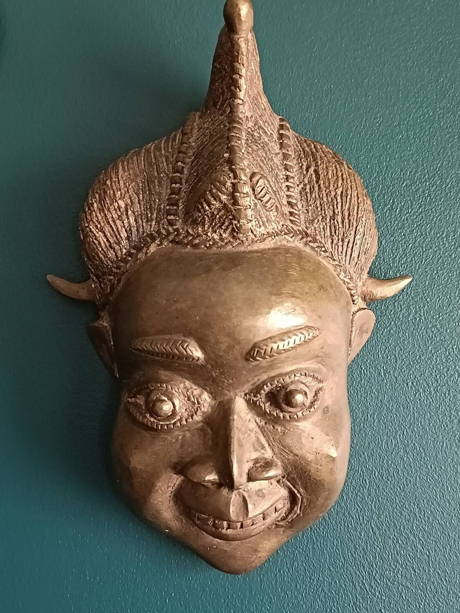 Masque africain vintage en bronze